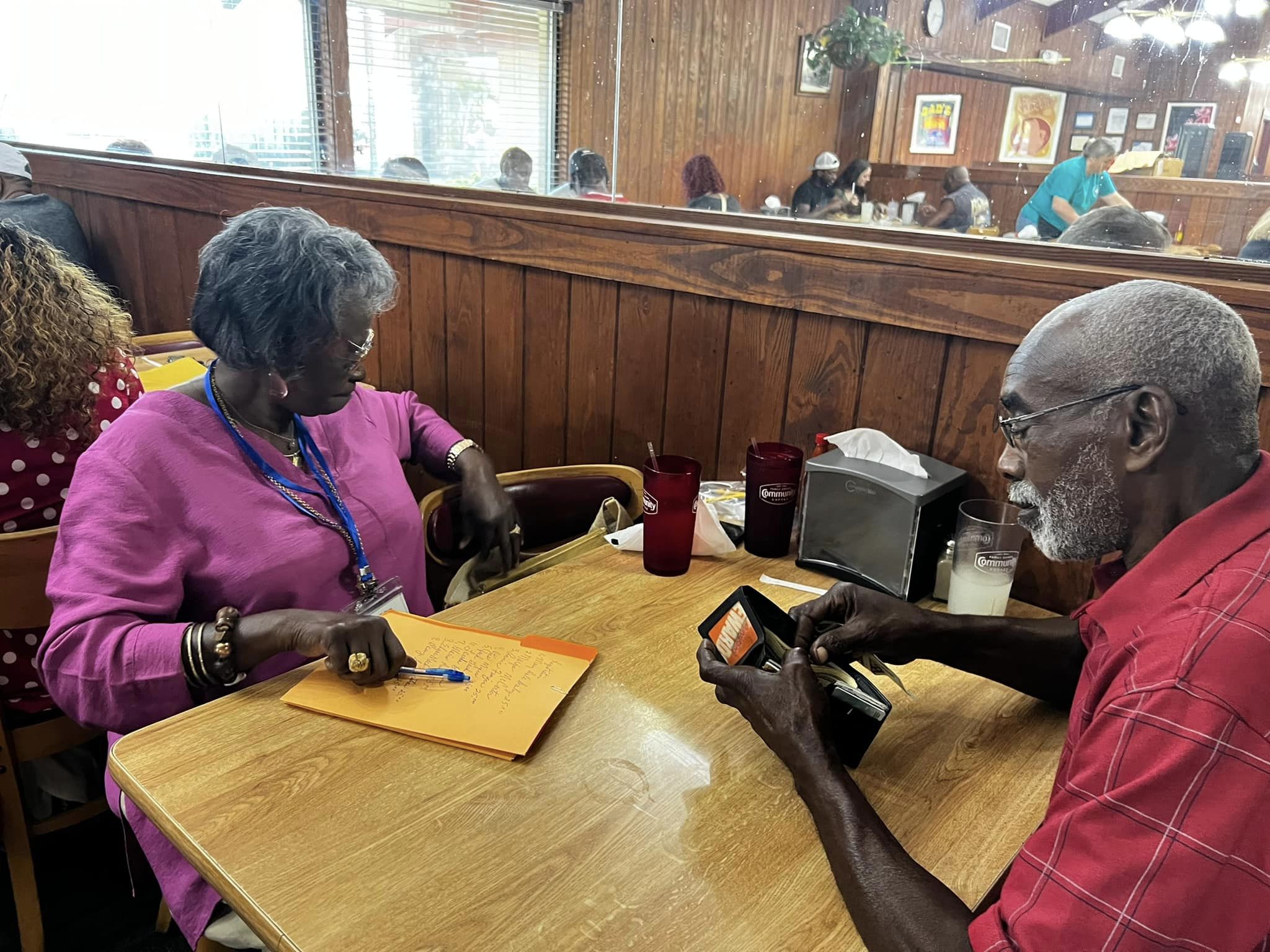 two people smiling